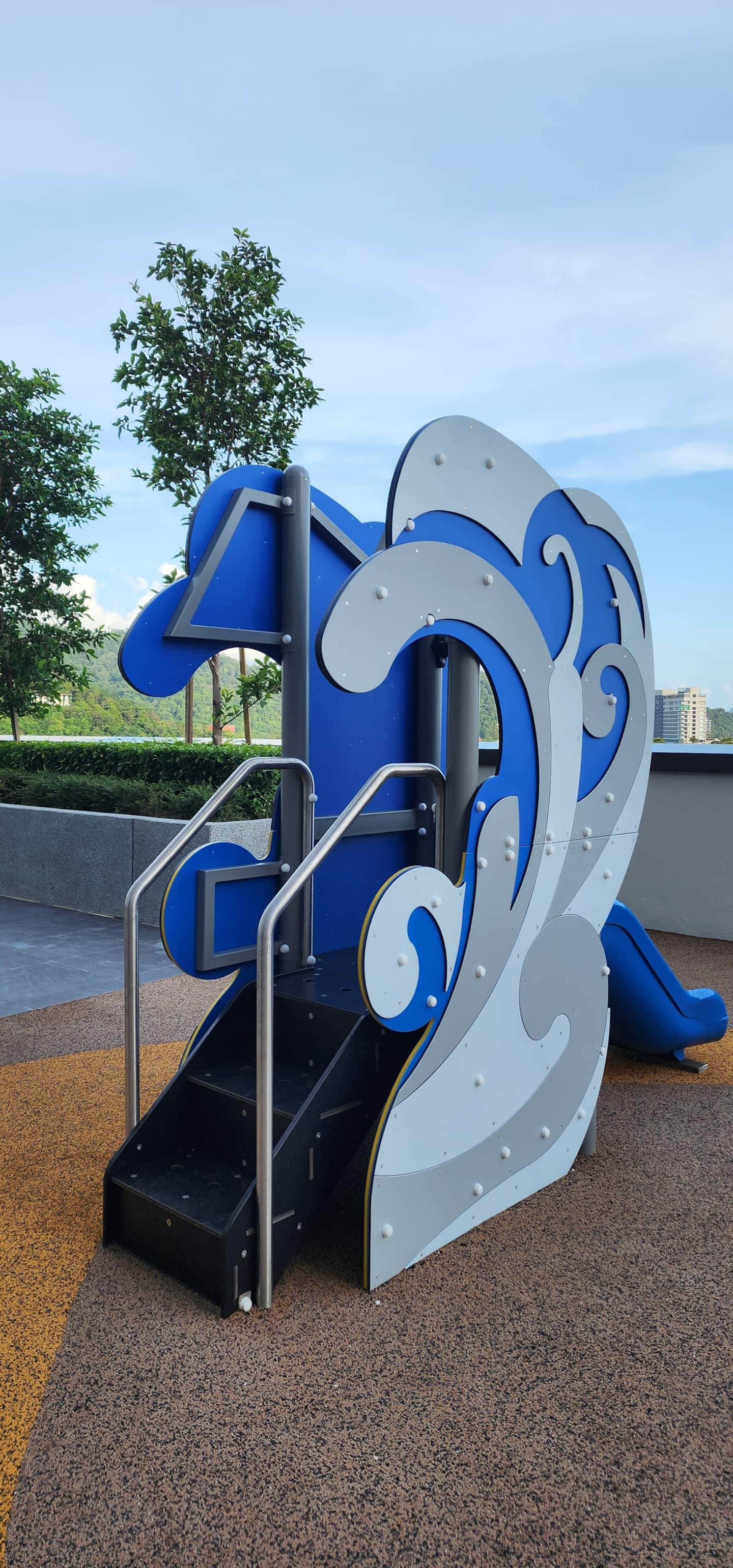 Wave slide playground